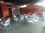 Área Externa com mesa de convidados