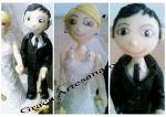 Noivos em biscuit para topo de bolo de casamento.