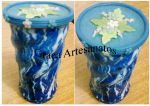 Latas de Nescau torcida, pintura em verniz vitral e tampa decorada com biscuit.