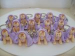 Lembrancinha chaveiro com boneco em biscuit personalizado para nascimento aniversário e chá de bebê
