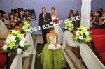 O casamento de Daiana e Denilson e seu pai conduzindo ao altar 