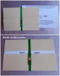 Convite 10x15cm.
Envelope entreaberto em papel Verg Coral 120gr, impresso em papel branco 180gr, aplicao fita cetim verde com lao chanel simples.