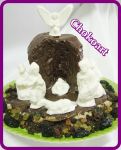 Panetone Prespio:
Massa Leve e Macia com Cobertura de Trufa Escura,Banhado com Chocolate e frutas secas.