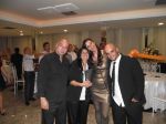 Celina, da ASSOMEDNI, e Banda Fugitivos de Tokyo, na festa de Confraternização da Associação Médica de Nova Iguaçu.