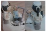 Odontólogo (dentista) realizando anamnese com paciente. Trabalho em biscuit para alunos da faculdade de odontologia de Anápolis.