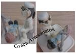 Outro ângulo. Odontólogo (dentista) realizando anamnese com paciente. Trabalho em biscuit para alunos da faculdade de odontologia de Anápolis.