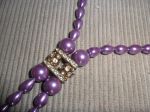 Detalhe em strass do Colar Lils!